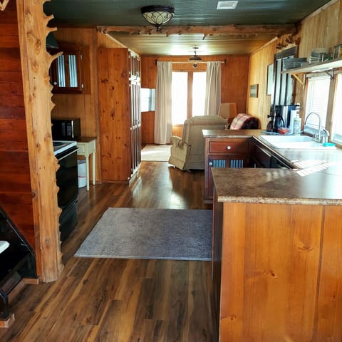 Stepping into the cottage.