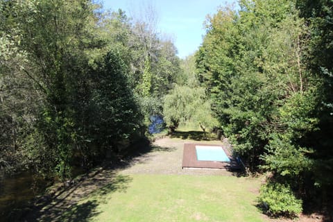 River, garden and pool.