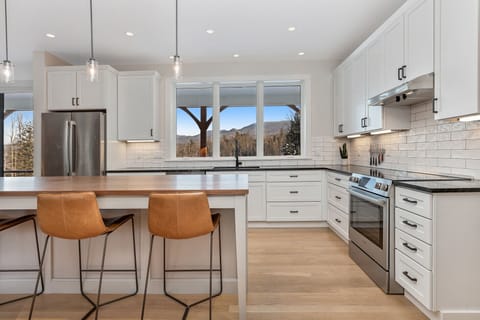Built in 2021, new, light and bright farmhouse perched on a hilltop. 
