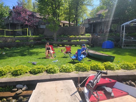 Always time for relaxing and talking at the cabin while the kids fish and swim.