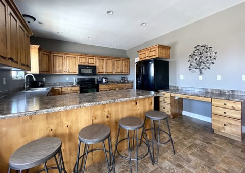 Main floor kitchen and bar.