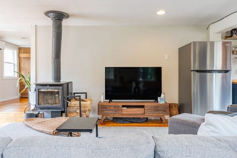 Immerse into the warmth of the wood stove while enjoying a movie night