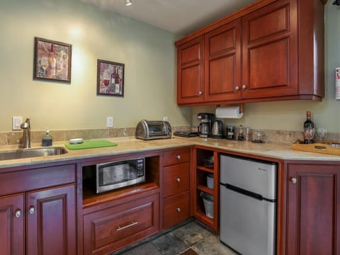 Kitchen has coffee or tea, plenty of space to have a great meal too