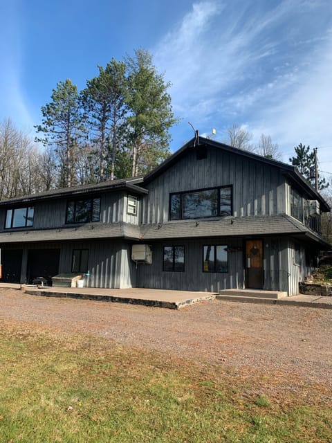 Outside view of the cabin. The full living area for guests is the second level