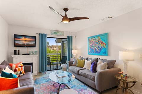 Spacious, comfy living room features a TV with cable and Firestick