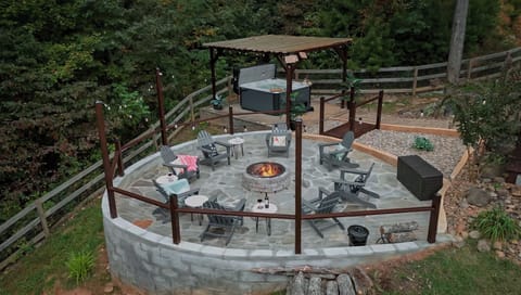 Experience an absolute outdoor Oasis from the spa like hot tub & custom fire pit