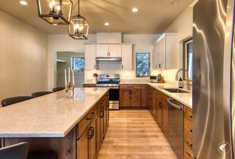 Kitchen with island seating at Camp Sunrise