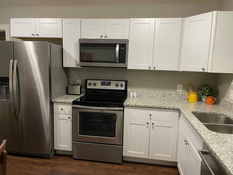 Kitchen-Refrigerator has filtered water and ice  in the door