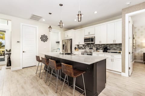 Kitchen, door to pantry and laundry.