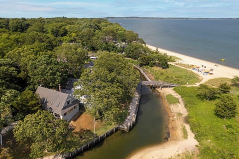 Private lagoon setting with beach access just steps away