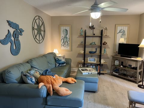 Comfortable and airy living room that welcomes conversation and movie-nights!