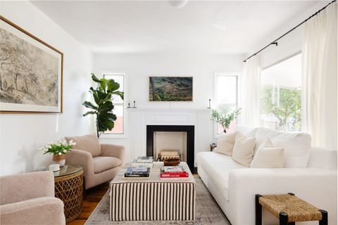 Charming and comfortable front living room with beautiful views