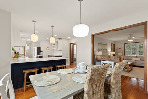 Dining Area & Kitchen Flow Into Cozy Living Room