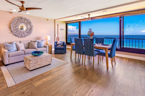 Enclosed lanai with ocean front view - Spacious living room with direct ocean views.