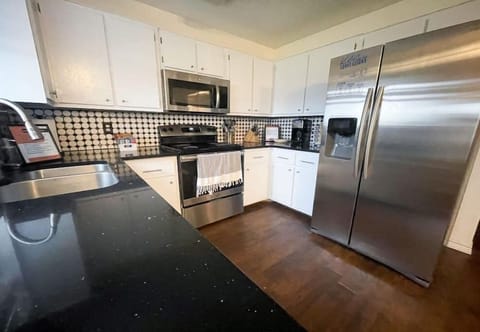 Fully stocked kitchen with full sized appliances