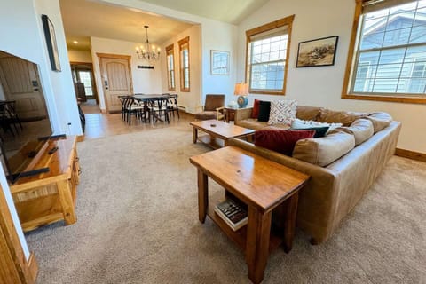 Whether you are cooking in the kitchen, eating at the dining table, or lounging in the living room, the open layout means you can always be a part of the fun in this condo.