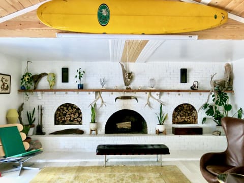 Living Room; fireplace, Full bar, music area, and movie room.