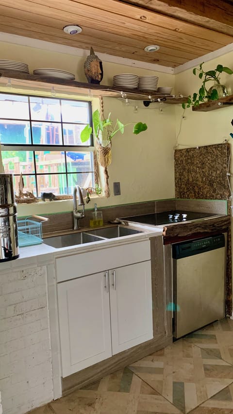 Kitchen w bar, seasonings, coffee, all amenities and tons you need.