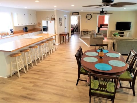 Open concept Main living and kitchen area upstairs.