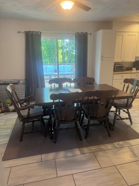 Main floor dining with access to main floor deck