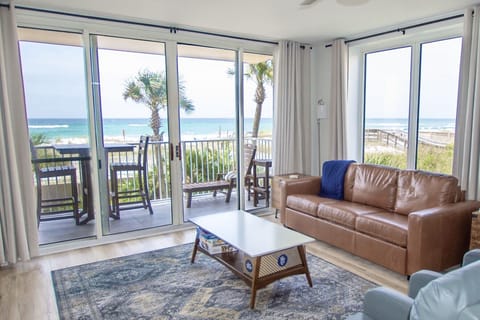 Corner unit with stunning views of the Gulf and beautiful patio gardens.