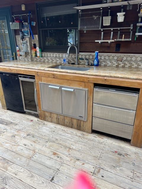 Sink with garbage disposal
2 beverage coolers
3 pull out drawer refrigerator