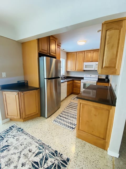 Well-equipped kitchen with drinkware, utensils, cookware, bakeware, etc. 