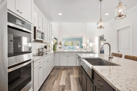 Kitchen Island with deep farm sink and double oven