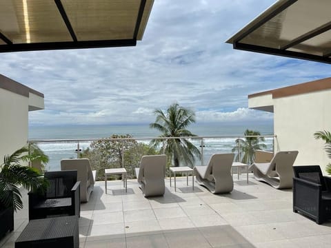 Lounge chairs at the shared rooftop terrace