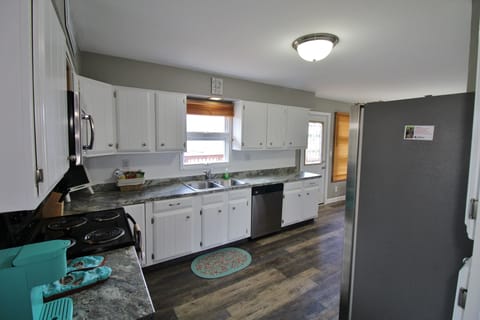 Fully equipped kitchen ready for home cooking get the family together 