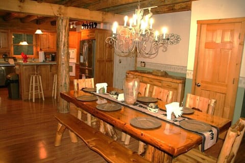 The cedar plank bench is a fun seating option for this beautiful table.