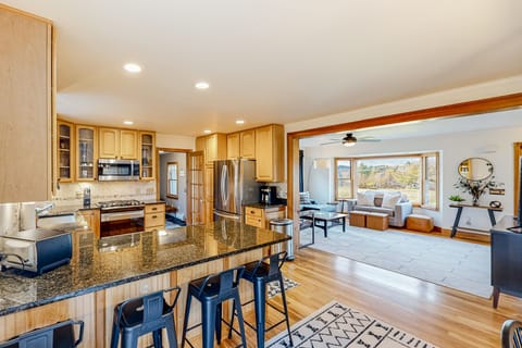 Open concept great room with chef's kitchen. 