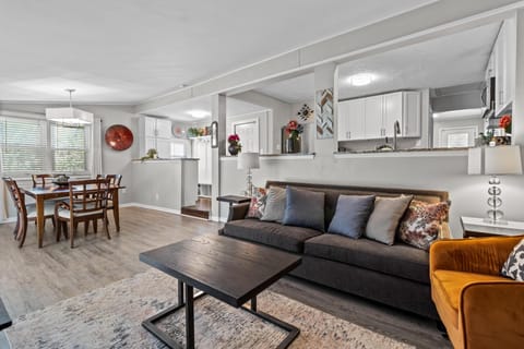 Bright and open living space with seamless flow into the dining room and kitchen—perfect for relaxing after exploring Waldo.