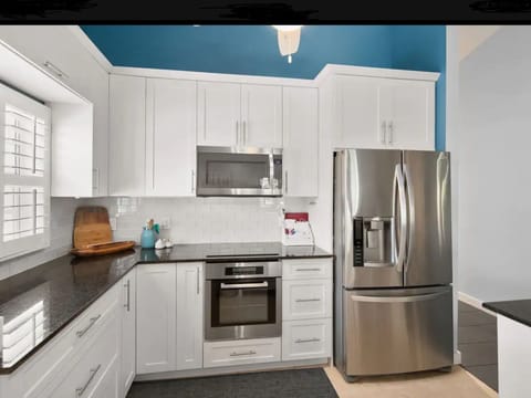 The Kitchen, dining and living room are all 1 open great room w/vaulted ceiling