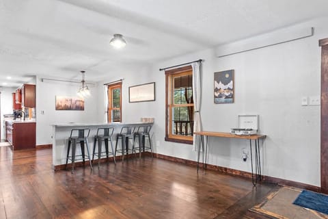 Modern, fully equipped kitchen featuring a large island — perfect for preparing and enjoying home-cooked meals.