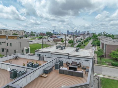 Private rooftop deck with skyline views – perfect for sunsets & pregame drinks
