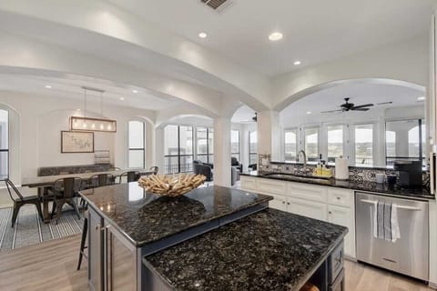 Large kitchen island with large dining table
