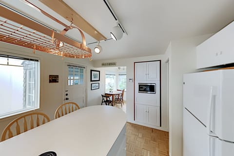 Kitchen with island & Breakfast Nook. Bright & airy - lots of room for everyone.