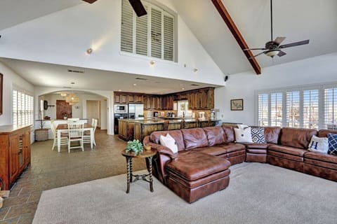 Spread out in the open-concept living, dining, and kitchen space at Lakeshore Haven—great views, easy together time, and a great experience on Lake Travis.