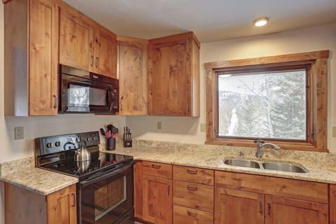 Kitchen with Marble Counters