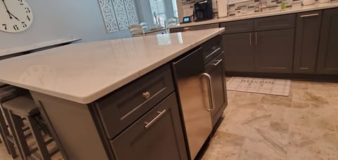 Island trash cans and built in ice maker!!