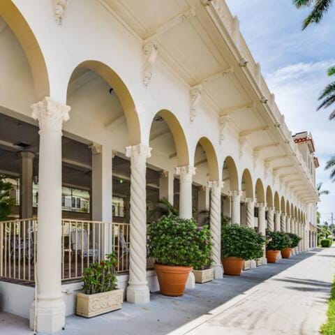 The Palm Beach Hotel is a true Historic Landmark showcasing stunning double bell tower Spanish Baroque architecture that exudes old-world glamour and the charm of a bygone era. Fun fact: Publix is conveniently located just across the street.