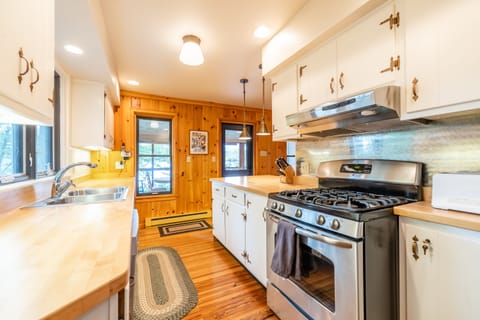 SPACIOUS KITCHEN OPEN TO DINING & LIVING ROOMS
