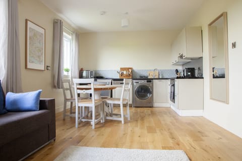 Clean and comfortable kitchen/living space. Light and bright.