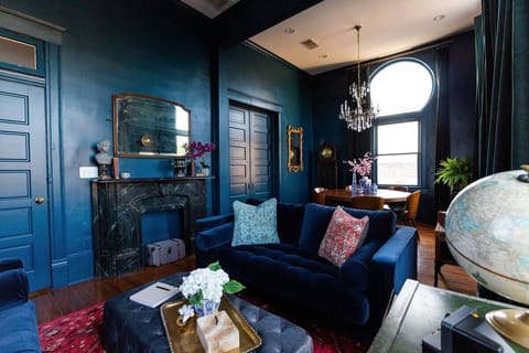 Experience tranquility in our living room with serene blue walls.