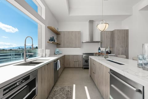 Open kitchen complete with high end appliances ready for your culinary advensture