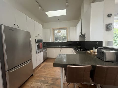Kitchen with updated appliances (and ALL the gadgets).
