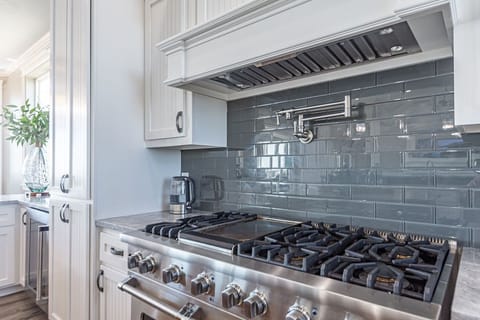 6 burner gas stove and double oven with pot filler