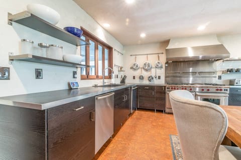 The chef's professional kitchen awaits your culinary creations.