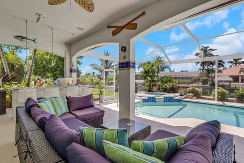 The ultimate SW Florida lifestyle awaits you in this stunning Gulf access home, starting with this enviable outdoor living space!